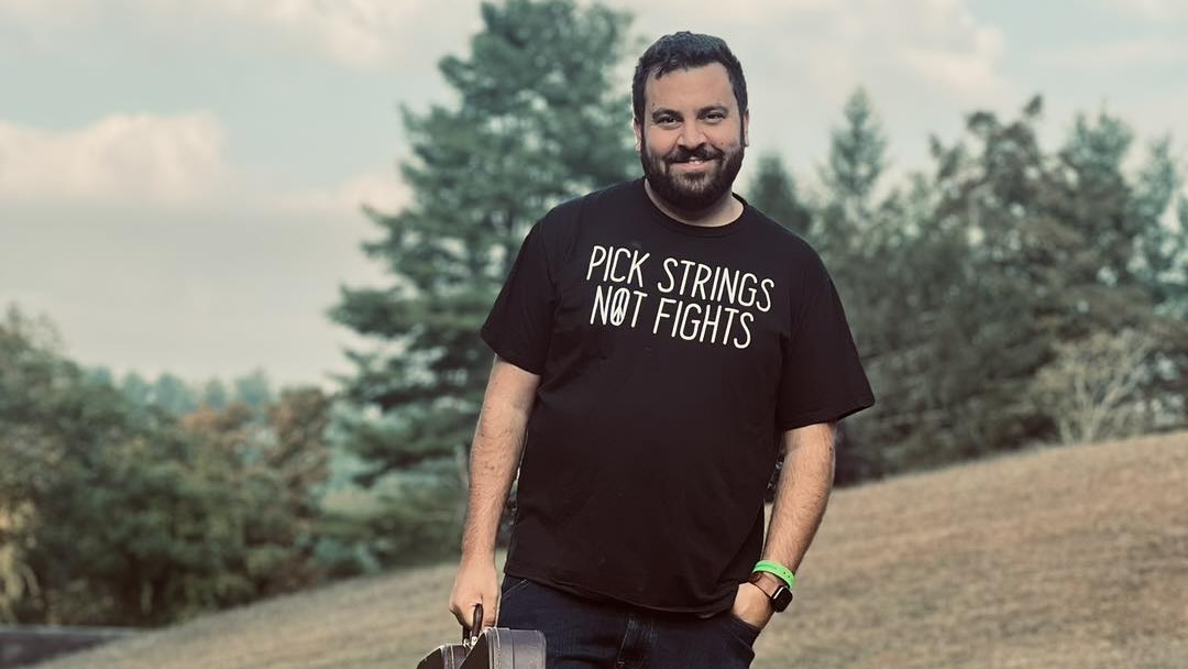 John Spignesi sings, plays guitar and writes music in the John Spignesi Band.